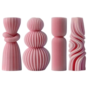 Pink silicone column candle molds with elegant knot and ribbed stripe textured designs