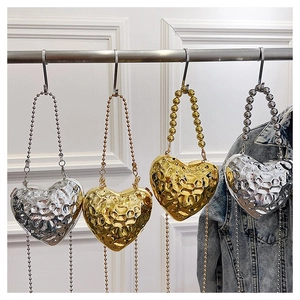 Chic heart-shaped acrylic evening bag with ice crackle texture and metal bead handle