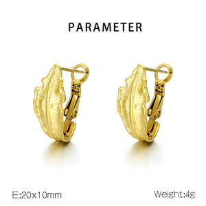 Detailed view of gold leaf earrings with feather texture measuring 20x10mm