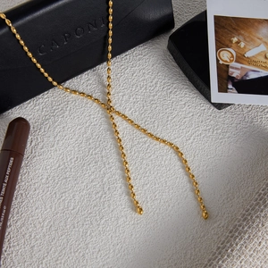 Polished gold stainless steel bead Y-necklace for women with elegant mirror finish design