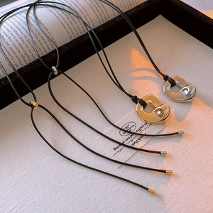 Minimalist irregular round slide pendant necklace set in gold and silver finish