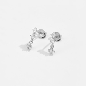Detailed view of S925 sterling silver drop earrings featuring clear cubic zirconia stones