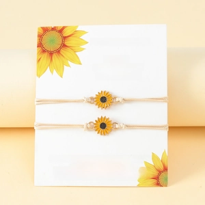 Friendship sunflower woven bracelet set with golden enamel charms on card