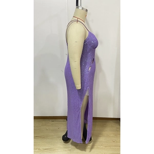 Detailed close-up of purple sequins and high-slit design on the evening dress