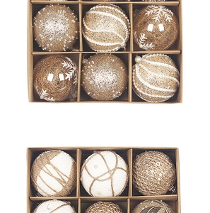 Close-up of 8cm Christmas ball ornaments with snowflake motifs and jute rope details