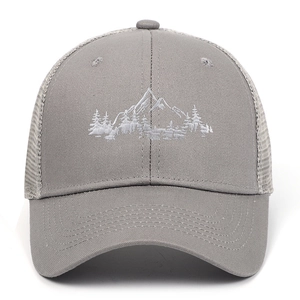 Grey trucker hat with white mountain embroidery and breathable mesh back for outdoor wear