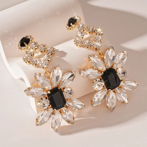 Sparkling flower drop earrings with black gemstone and crystals in gold finish