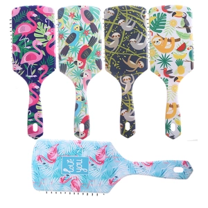 Set of five large air cushion hairbrushes with tropical flamingo and sloth prints