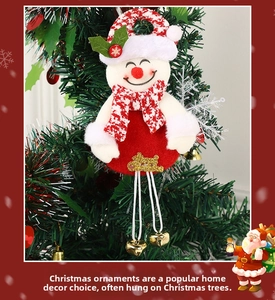 Detailed view of plush snowman ornament with red scarf and gold Merry Christmas bell charms