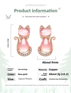 Macro view of pink cat earrings with rose gold copper frame and cubic zirconia stones