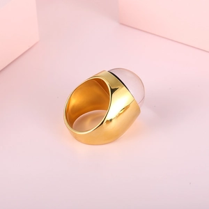 Exaggerated gold stainless steel ring with a large pink glass gemstone for women