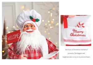 Close-up of Santa chef figurine with red checkered apron and Welcome holiday sign