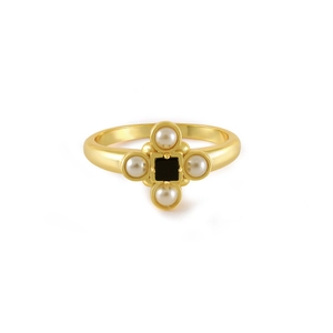 Detail of a vintage gold ring featuring four white pearls and a square black onyx stone