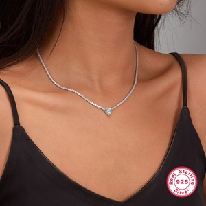 925 Sterling Silver tennis necklace featuring a light blue heart-shaped cubic zirconia pendant
