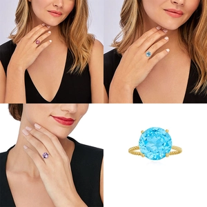 Detail of twisted gold ring bands set with large round pink, blue, and purple gemstones
