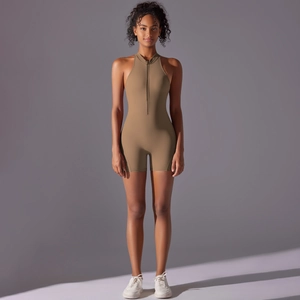 Detailed front view of high-stretch coffee brown yoga bodysuit with half-zipper neckline