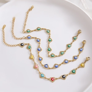 Adjustable golden stainless steel bracelet featuring colorful heart-shaped evil eye charms
