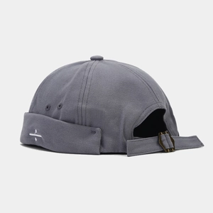 Detailed view of the dark gray canvas miki hat featuring side embroidery and adjustable buckle