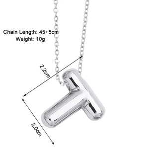 Macro shot of silver 3D balloon letter T pendant necklace with size annotations