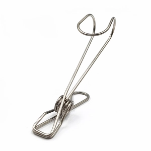 Close-up of a stainless steel wire clip with hook for laundry and document storage