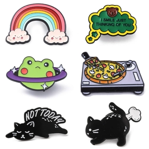 Set of 6 colorful enamel pins including cute cat, UFO frog, and rainbow cloud designs