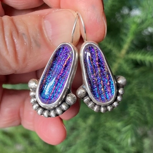 Vintage oval silver earrings with iridescent rainbow glass and floral metal accents