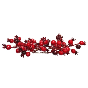 Macro detail of red artificial berry branch with glossy finish for festive decoration