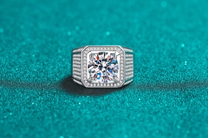 Macro detail of men's S925 silver ring featuring a large center stone and pavé diamonds