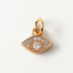 Macro shot of 18k gold plated evil eye pendant with clear zircon micro-pave setting