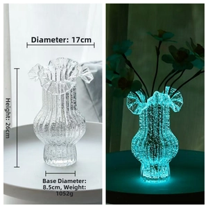 Detailed view of luminous glass vase with ribbed texture and wavy rim, 26cm height