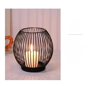 Detail showing Nordic black wire sphere candle holder casting radial shadows