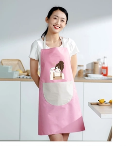 Pink waterproof apron with a white front pocket and feminine illustration in a kitchen