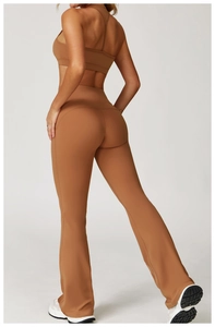Detailed back view of caramel flared yoga pants with high-waisted seamless design