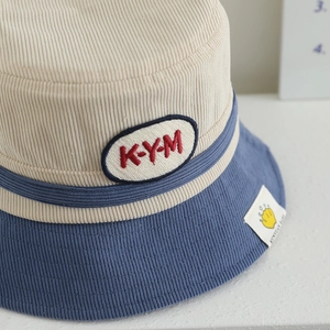 Kids corduroy bucket hat with bear letter patch in contrast beige and blue colors