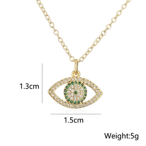 Detail view of 18K gold plated Evil Eye pendant with size and weight measurements