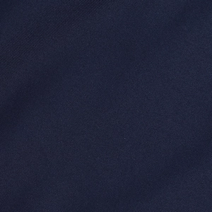 Close-up of deep blue slim-fit dress fabric showing fine knit texture and weave