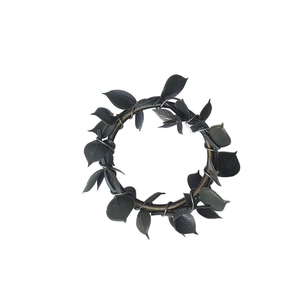 Rustic farmhouse napkin ring with deep green artificial leaves on bronze wire wreath