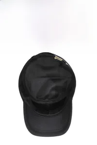 Detail of breathable mesh lining and adjustable metal buckle on black flat top cap