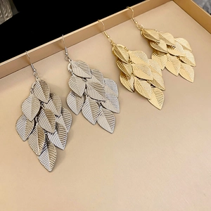 Metallic leaf tassel drop earrings in gold and silver finish with detailed textures