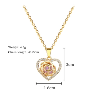 Detail view of heart pendant necklace with rose design and dimensions specifications