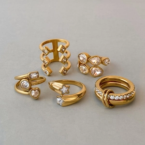 Five-piece set of gold-plated stainless steel rings with zircon stars and hollow patterns