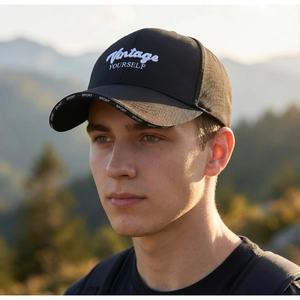 Close-up of black baseball cap with Vintage embroidery and Sport detail on brim