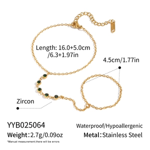 Detailed specs of gold stainless steel finger chain with geometric olive green zircon