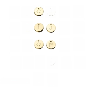 Flat lay of 26-piece A-Z engraved round alphabet pendants in brushed gold finish