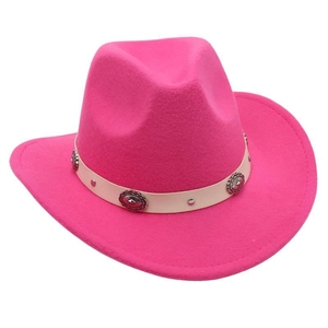 Detail of hot pink felt cowboy hat with leather band and vintage silver flower conchos