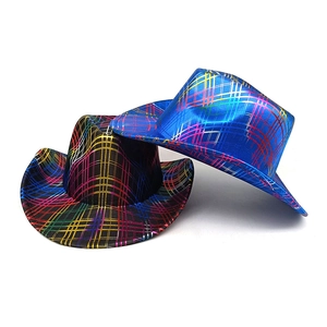 Close-up of shiny cowboy party hats with colorful neon grid patterns in blue and black