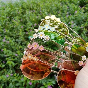 Collection of colorful daisy floral children sunglasses in various vibrant candy colors