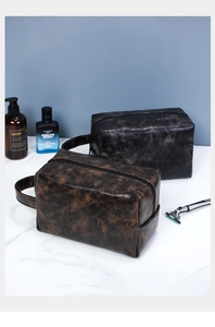 Macro shot of waterproof PU leather toiletry bag with vintage cracked texture and zipper