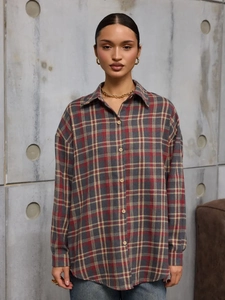 Oversized plaid flannel shirt with retro red and yellow checks and classic lapel collar