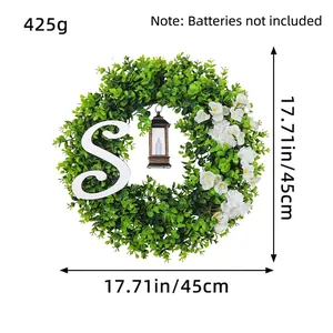 Eucalyptus Christmas wreath with lantern, letter S and white flowers, 45cm diameter